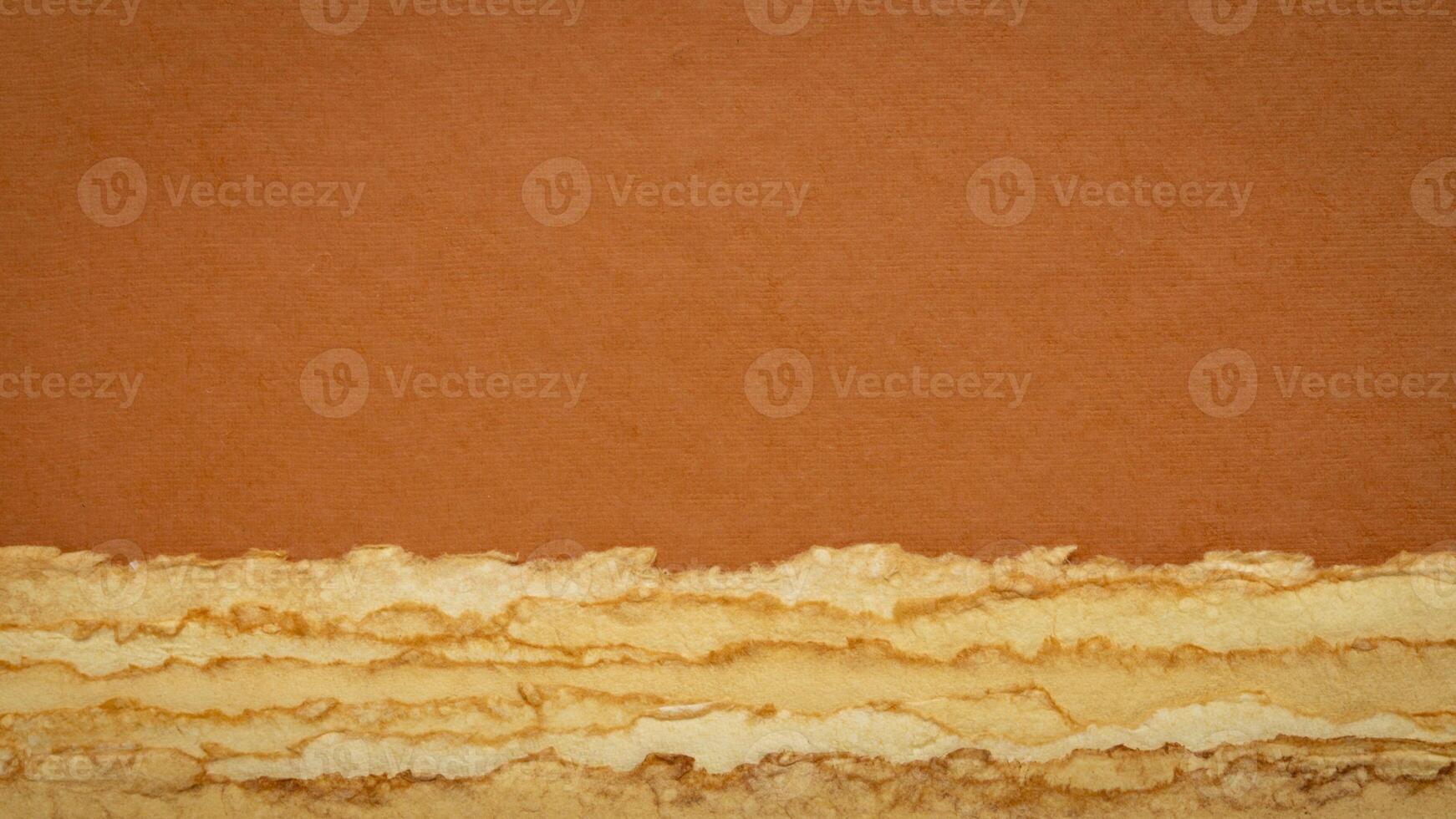 abstract Martian desert landscape in orange and yellow pastel tones - collection of handmade rag papers photo