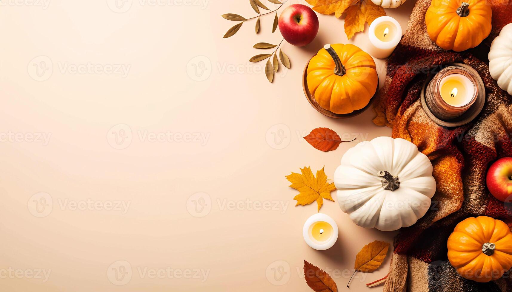 Thanksgiving background with white and orange pumpkins, apples, candles, leaves and a cloth on light beige background with copy space on the left. Top view. photo