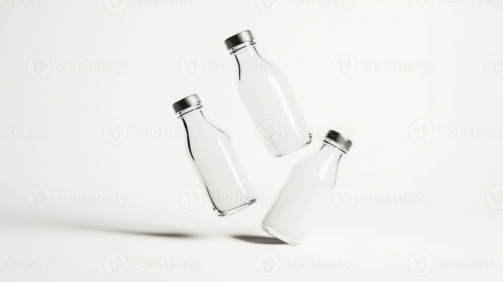 Clear glass bottles floating against a minimalistic white background in a modern studio setting photo