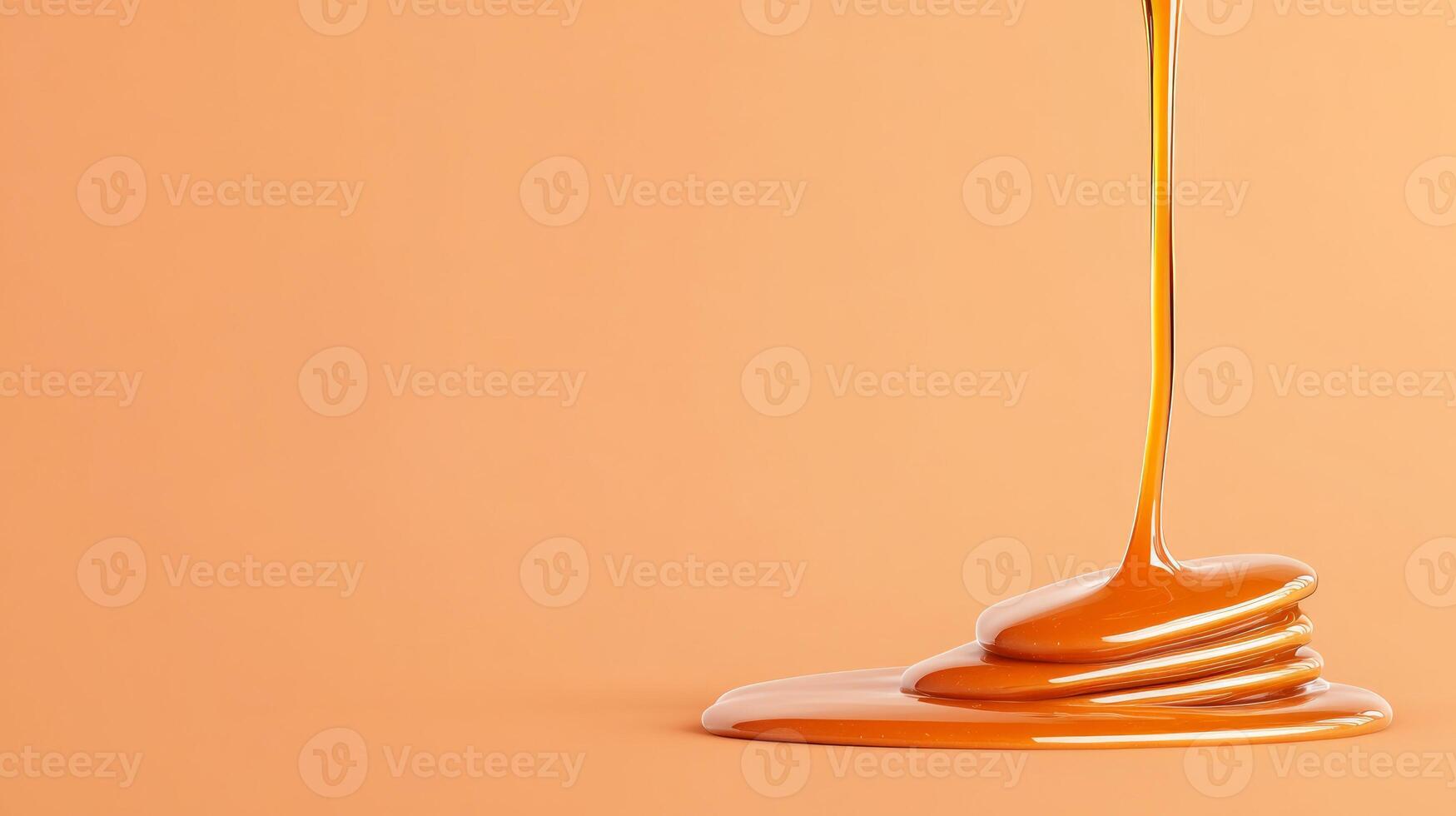 Golden honey flows gracefully onto a flat surface, highlighting its viscous texture and inviting color, perfect for food-related projects or culinary arts photo