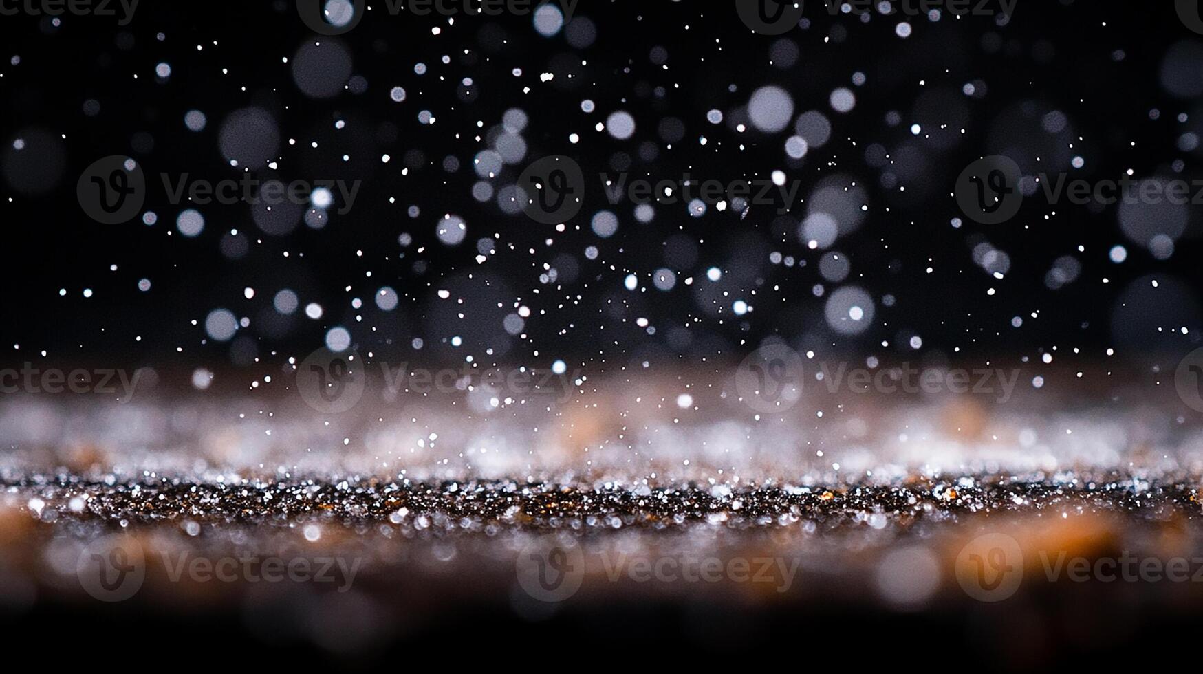 Snowflakes Falling on a Dark Background with Soft Light photo