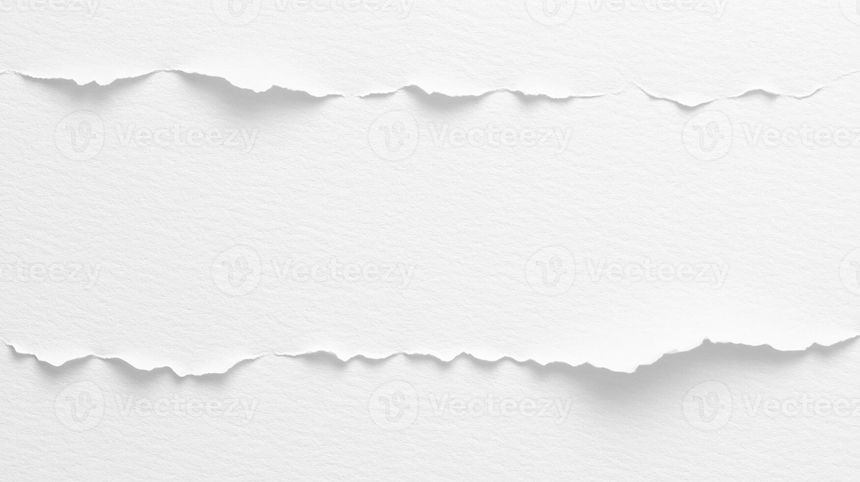 Close-Up of Torn White Paper with Jagged Edges photo