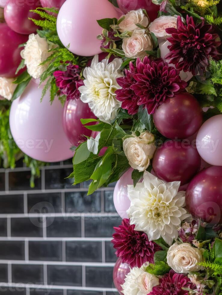 A balloon arch made of flowers and balloons photo