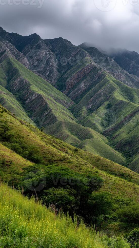 Beautiful green mountains under a cloudy sky in nature photo