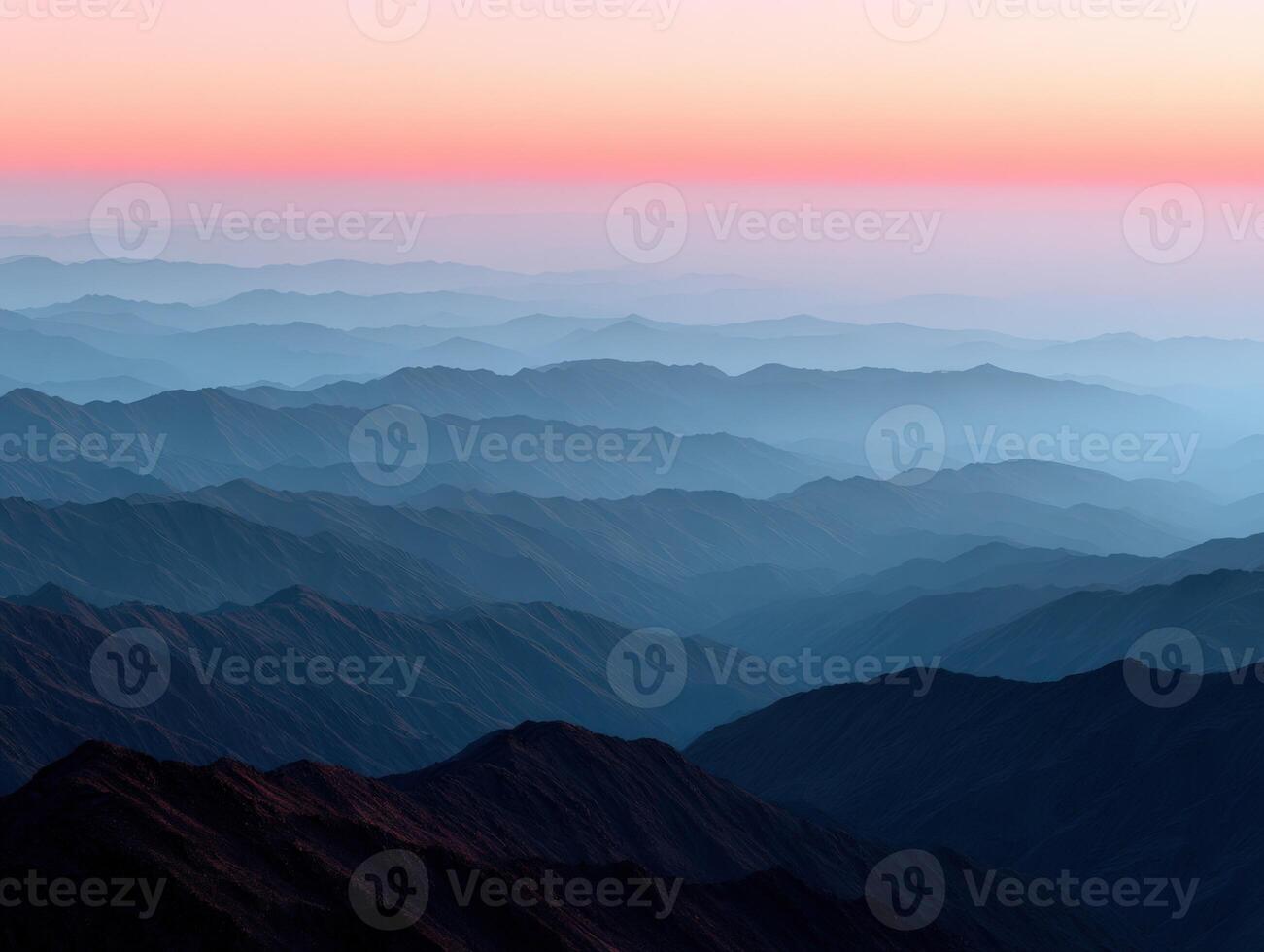 Majestic mountain range at dawn with vibrant colors photo