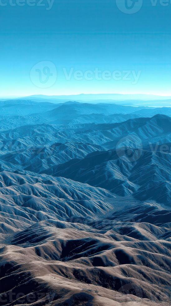 Majestic mountain range viewed from above on a clear day photo