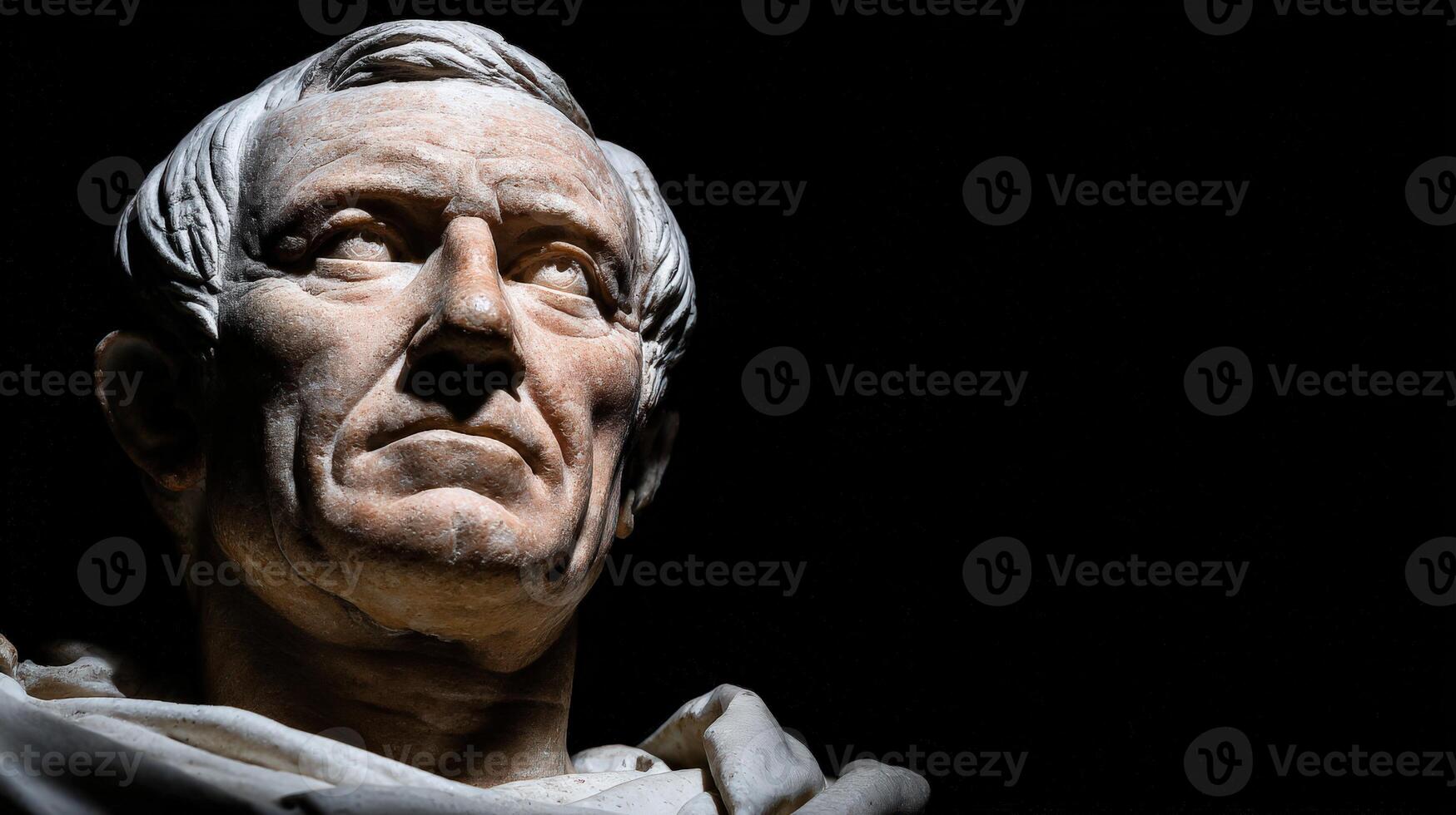 Stoic marble bust showcasing classical artistry and expression in low light photo