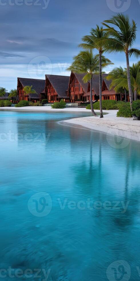 Relaxing moments by the tranquil lagoon with rustic lodges and palm trees photo