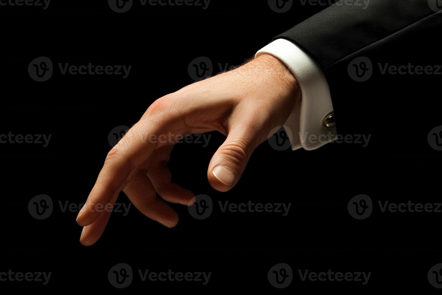 Elegant hand reaching out against a dark background, symbolizing connection and invitation photo