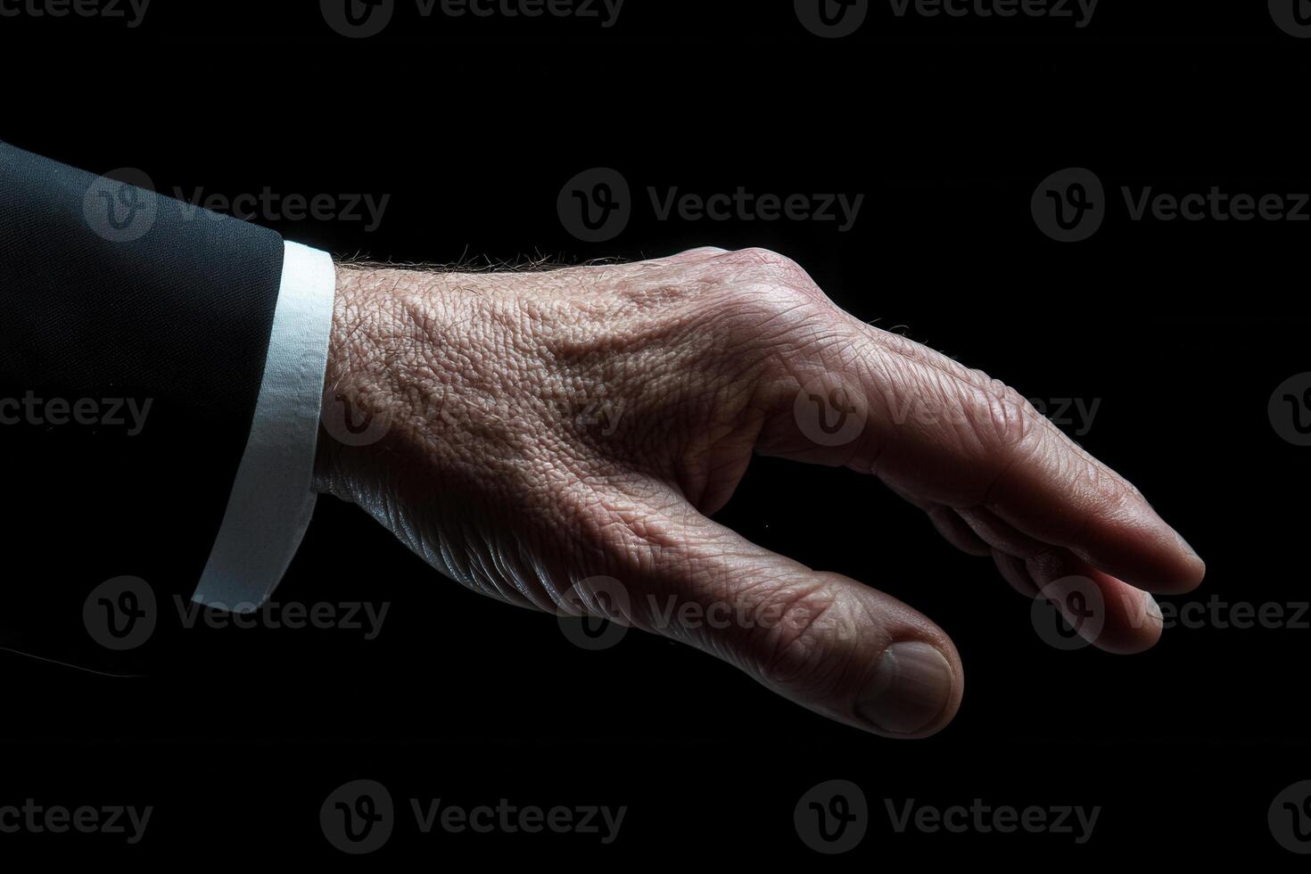 Elegant human hand reaching out in a dark setting, symbolizing connection and opportunity photo