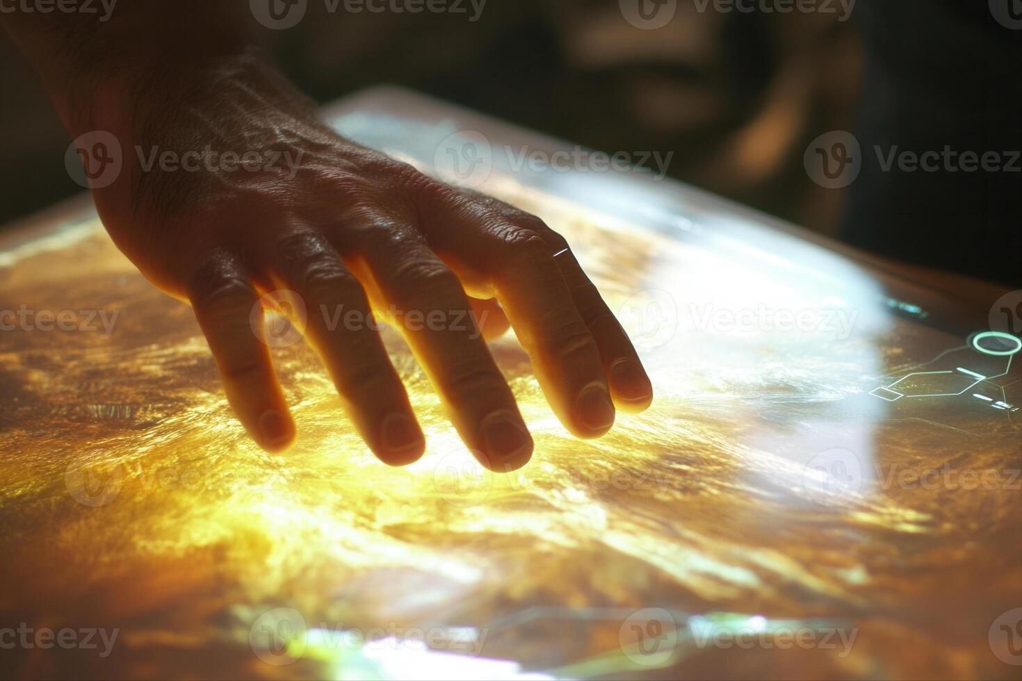 A human hand interacting with a glowing, interactive surface displaying vibrant textures photo