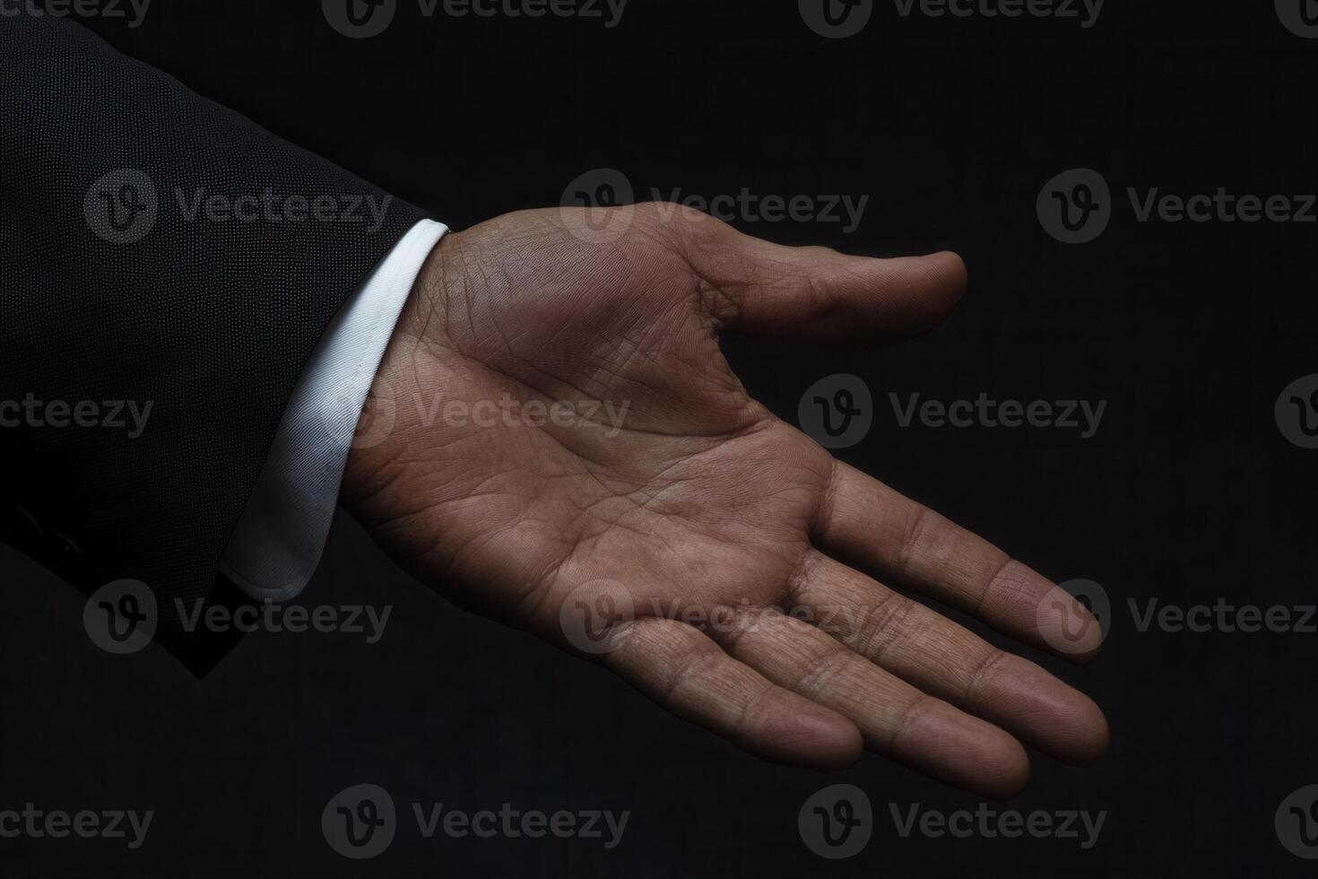 Elegant hand gesture extended in a professional setting, symbolizing invitation and connection photo