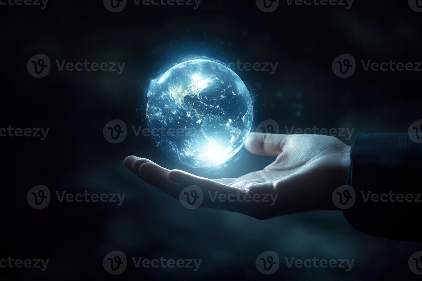 A human hand gently cradles a glowing globe symbolizing global unity and care photo