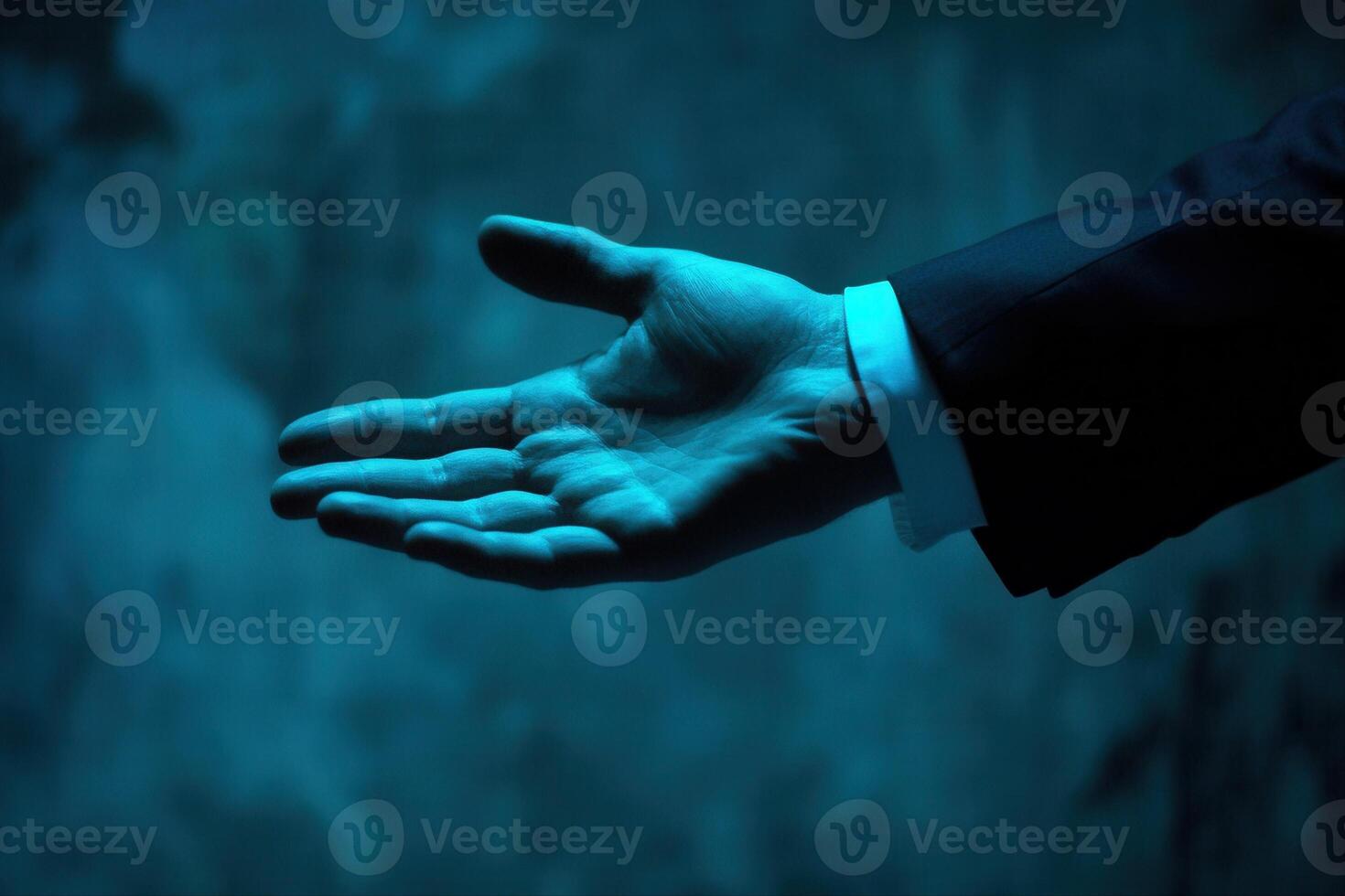 Elegant hand gesture in a dimly lit setting, conveying invitation and mystery photo