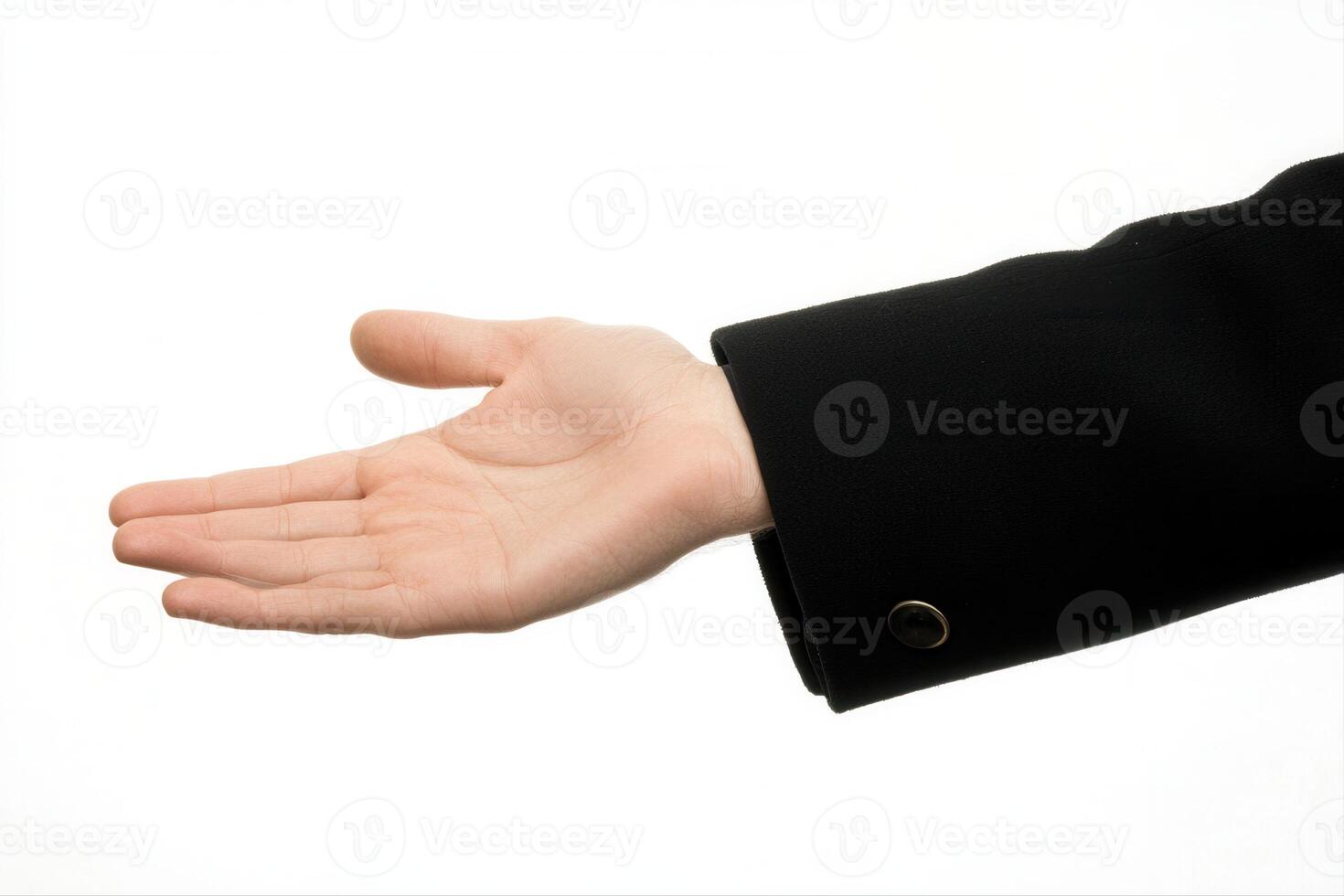 Outstretched hand in a formal suit against a plain background, symbolizing invitation photo