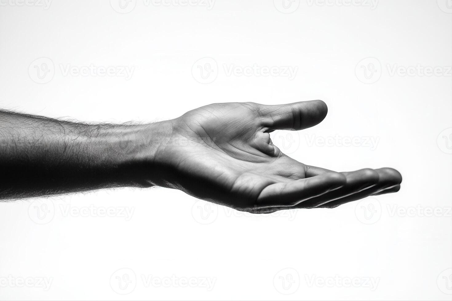 Outstretched hand in black and white, symbolizing openness and invitation against a minimal background photo