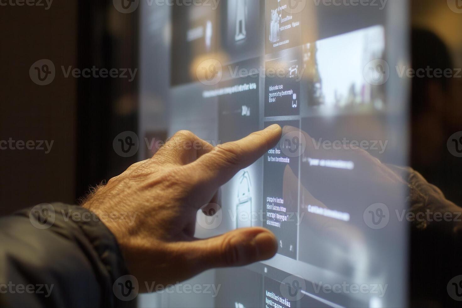 Person interacting with a digital display in a modern environment, showcasing technology photo