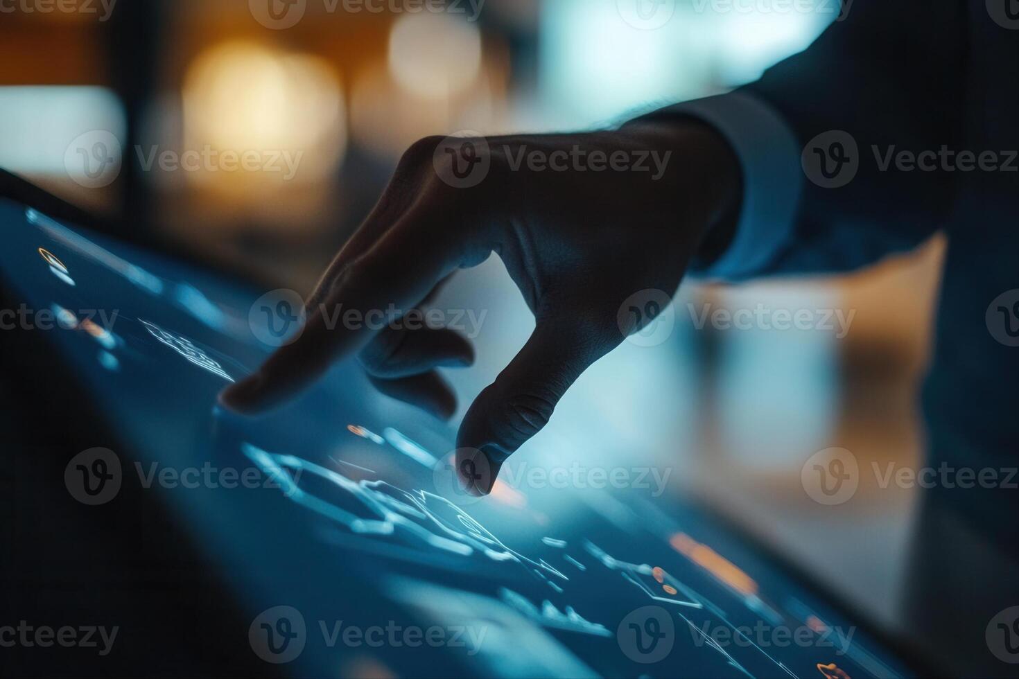 Person interacting with a touchscreen interface displaying data analytics in a modern setting photo