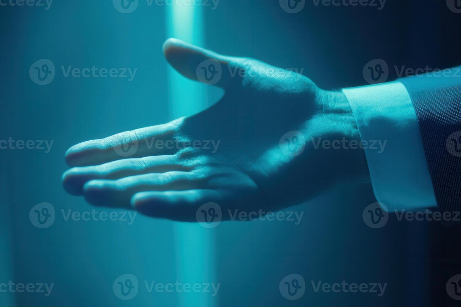 Hand reaching out in a dimly lit environment, symbolizing connection and opportunity photo