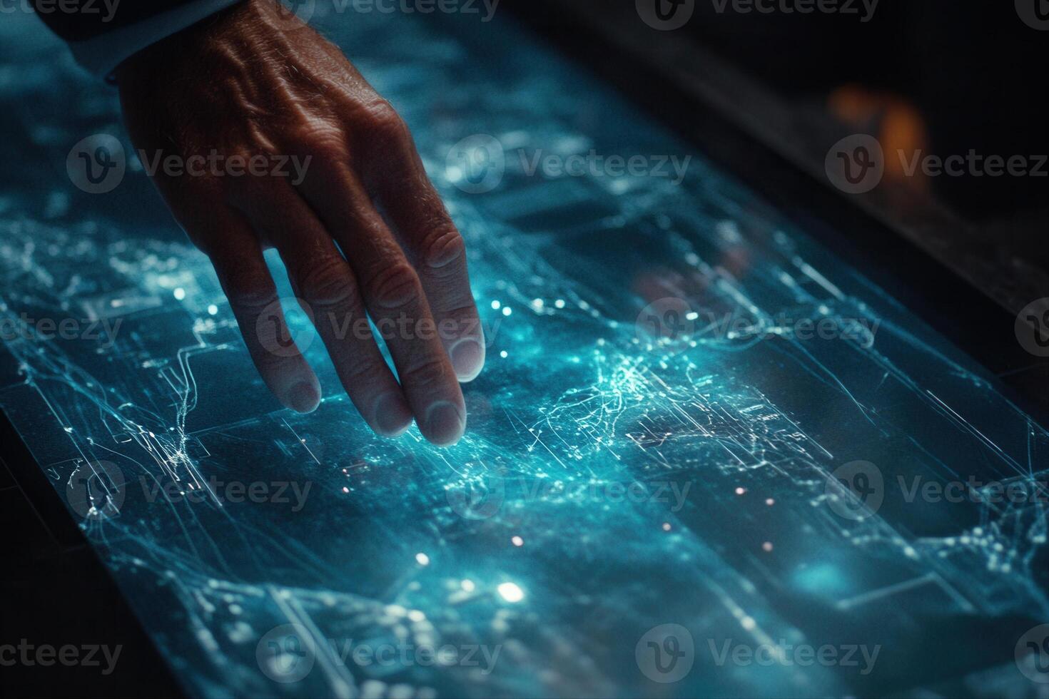 Futuristic hand interacting with a glowing touchscreen interface displaying data analytics photo