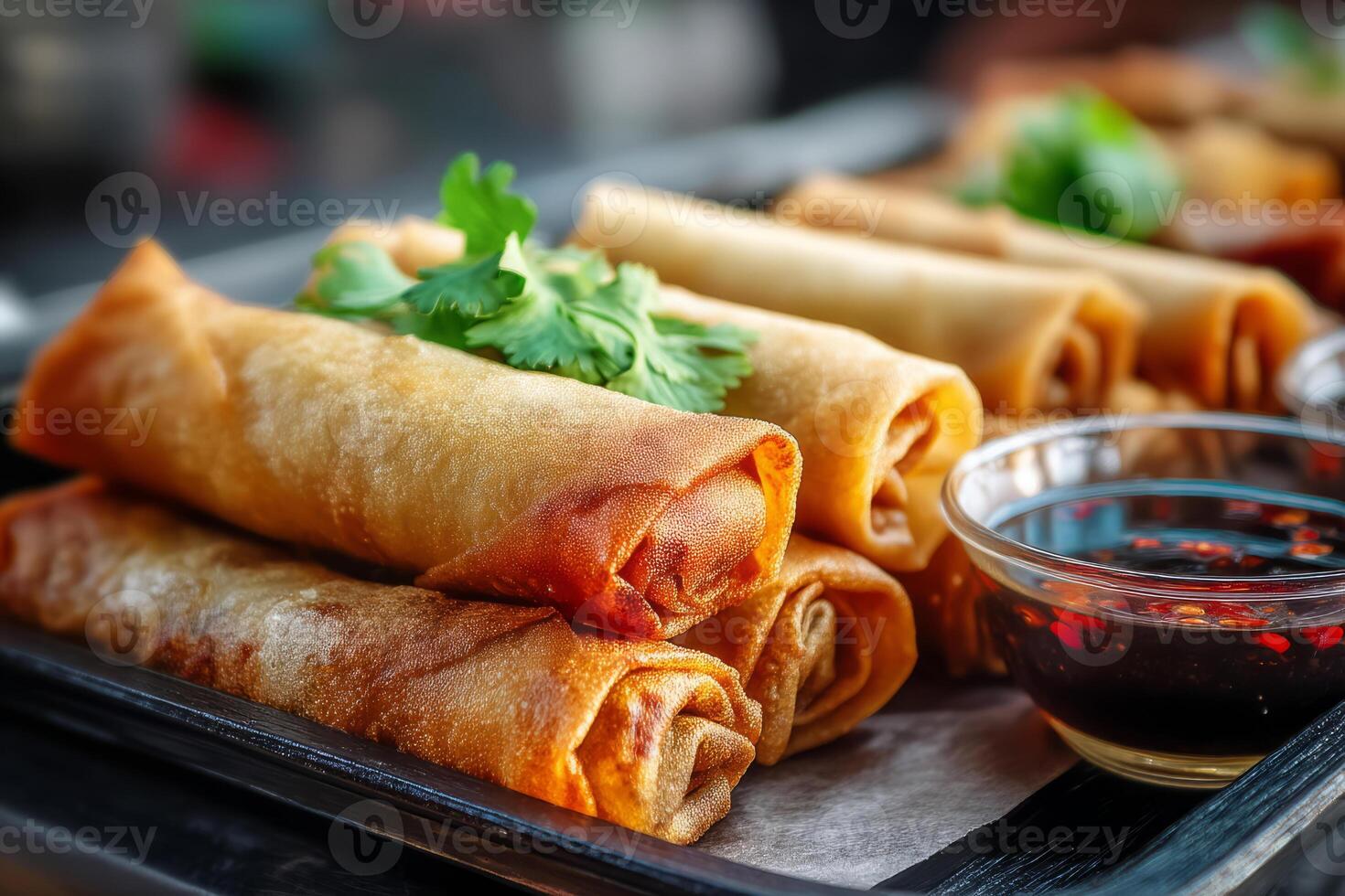 Fried spring rolls with spicy dipping sauce photo