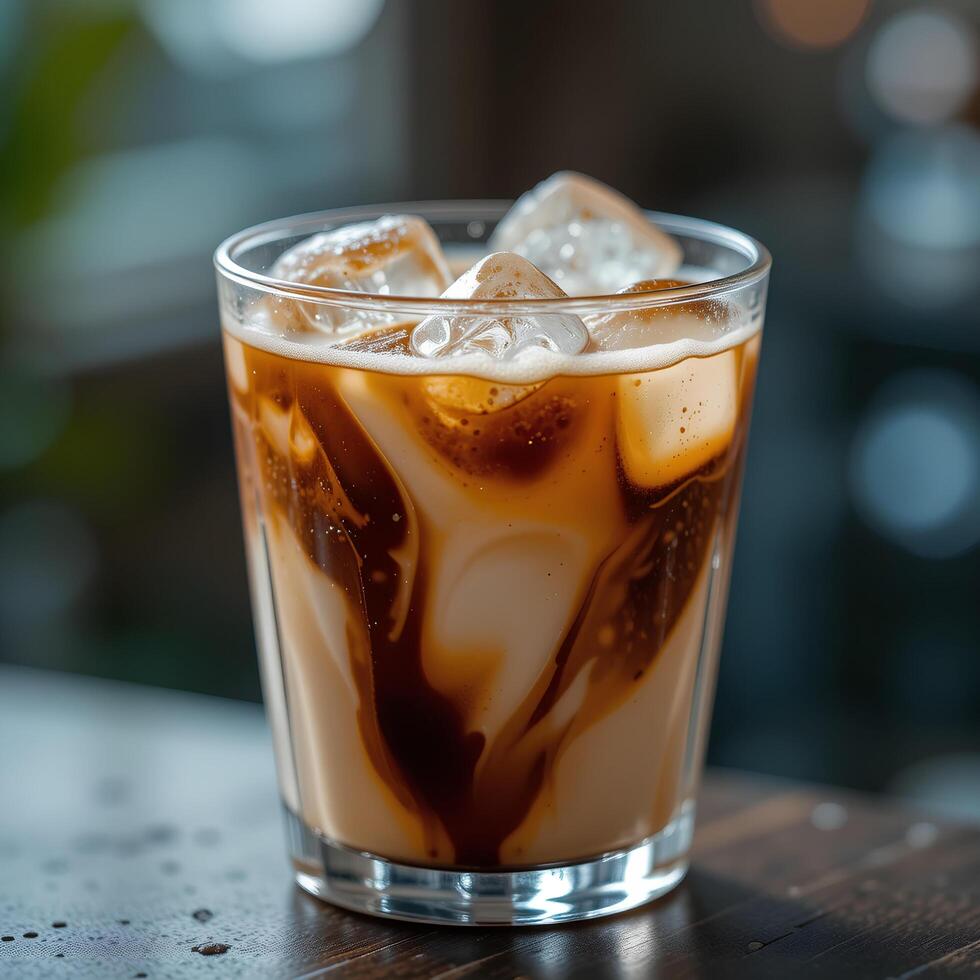 an iced coffee with ice and caramel photo