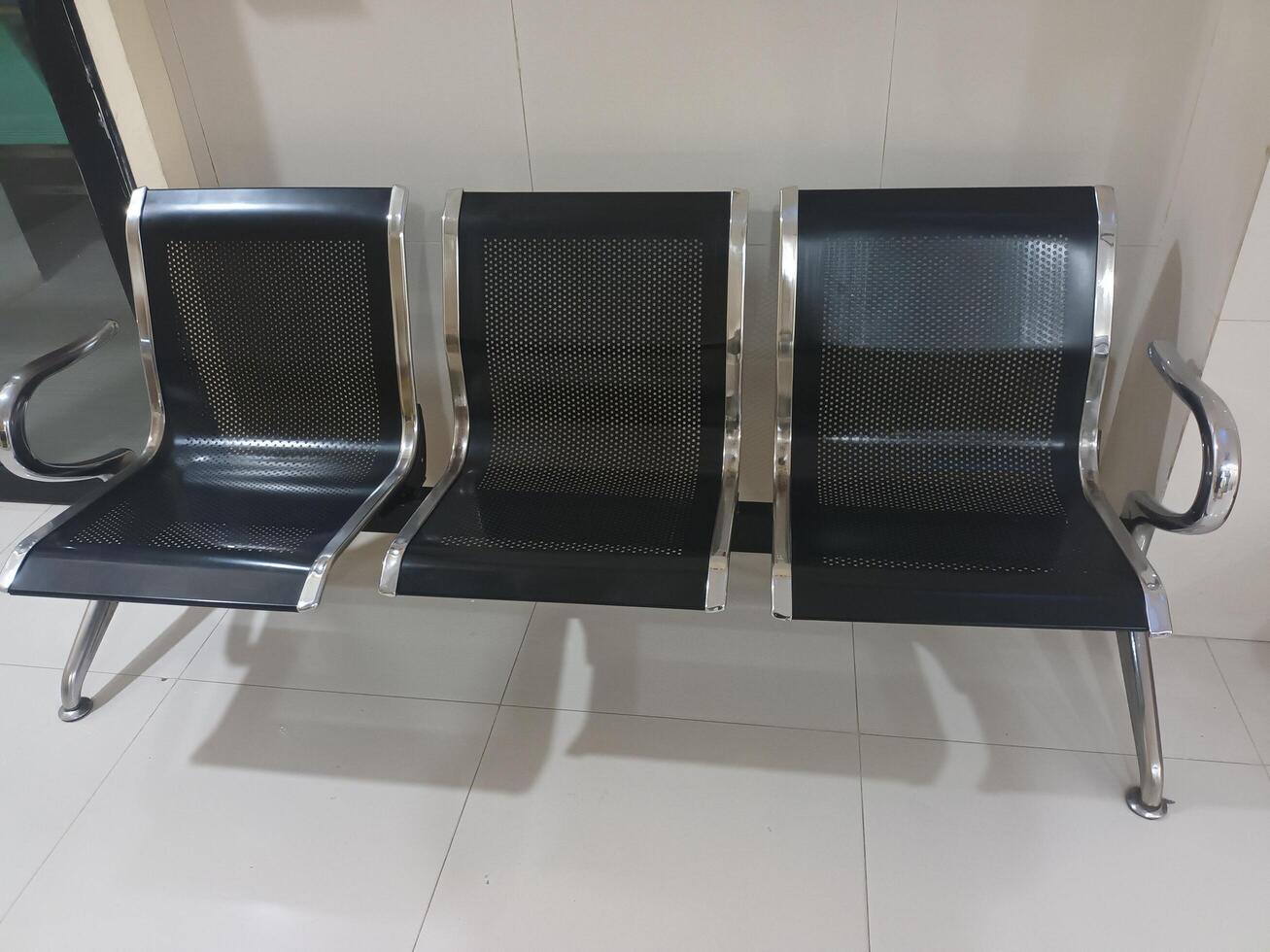 Three-Seater Metal Waiting Bench photo