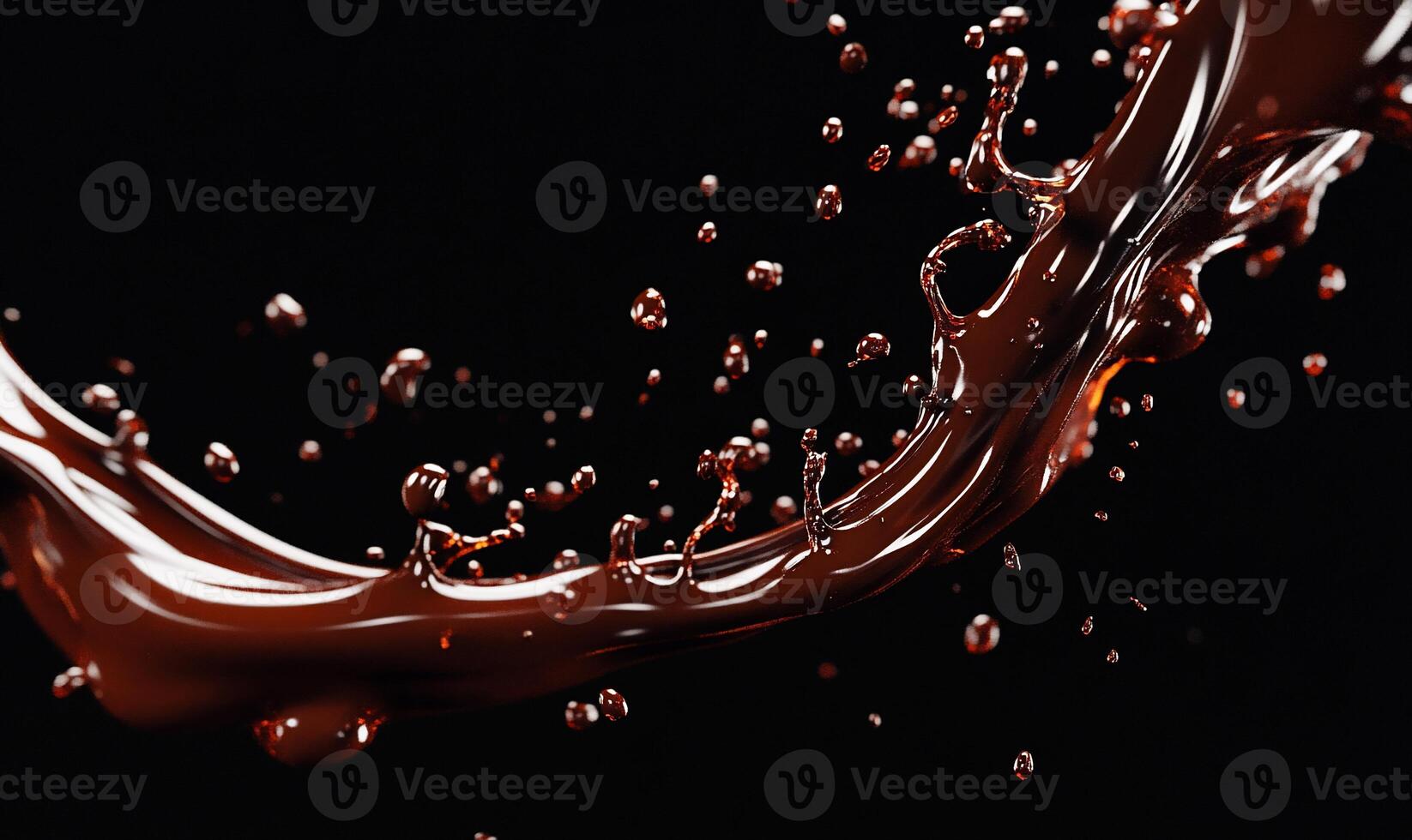 Dark liquid splash in motion. A dynamic, fluid stream of dark liquid, with numerous small droplets scattered throughout, against a black background photo