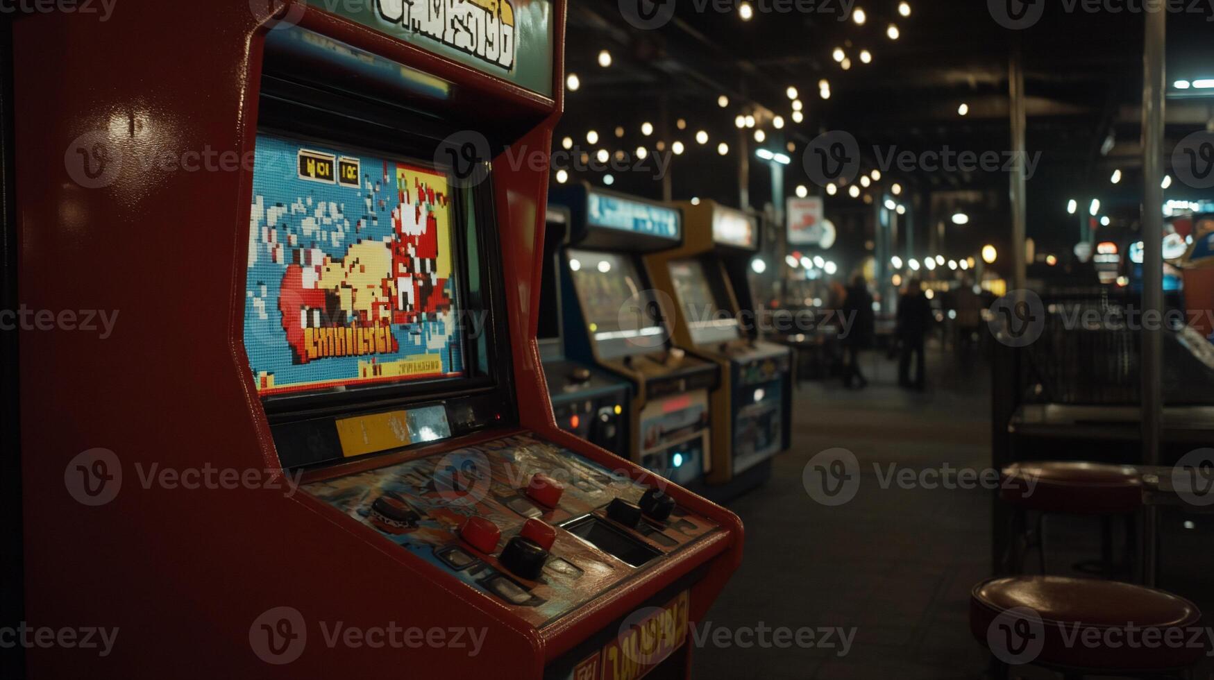 Vintage arcade game cabinet at night. Colorful game display, buttons, and levers. Blurred background shows more arcade machines and people photo