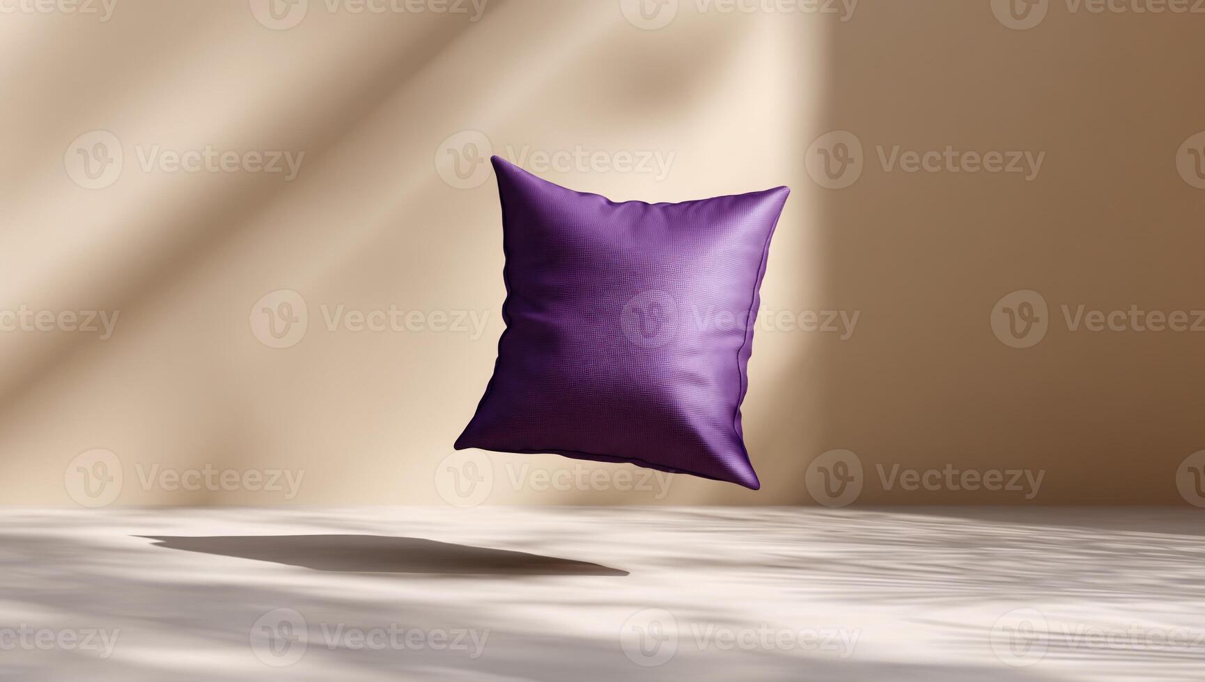 Purple square pillow floats in a minimalist setting. Soft lighting creates shadows photo