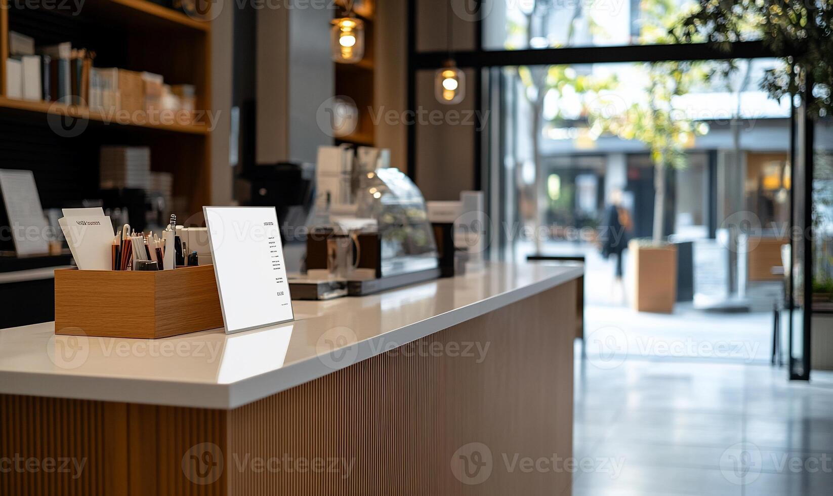 Modern cafe counter with blank sign. Light wood, white countertop, open space photo