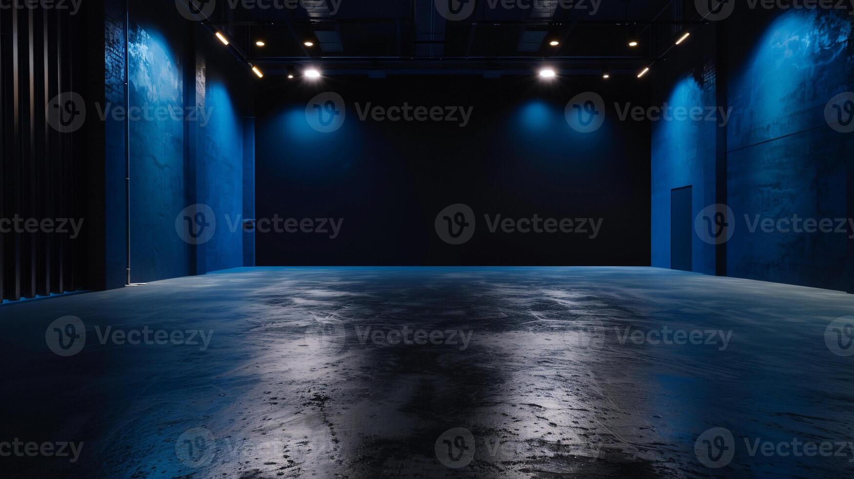 Empty room with blue lighting and concrete floor photo