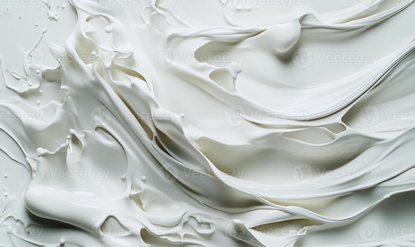 Abstract swirls of white liquid paint photo