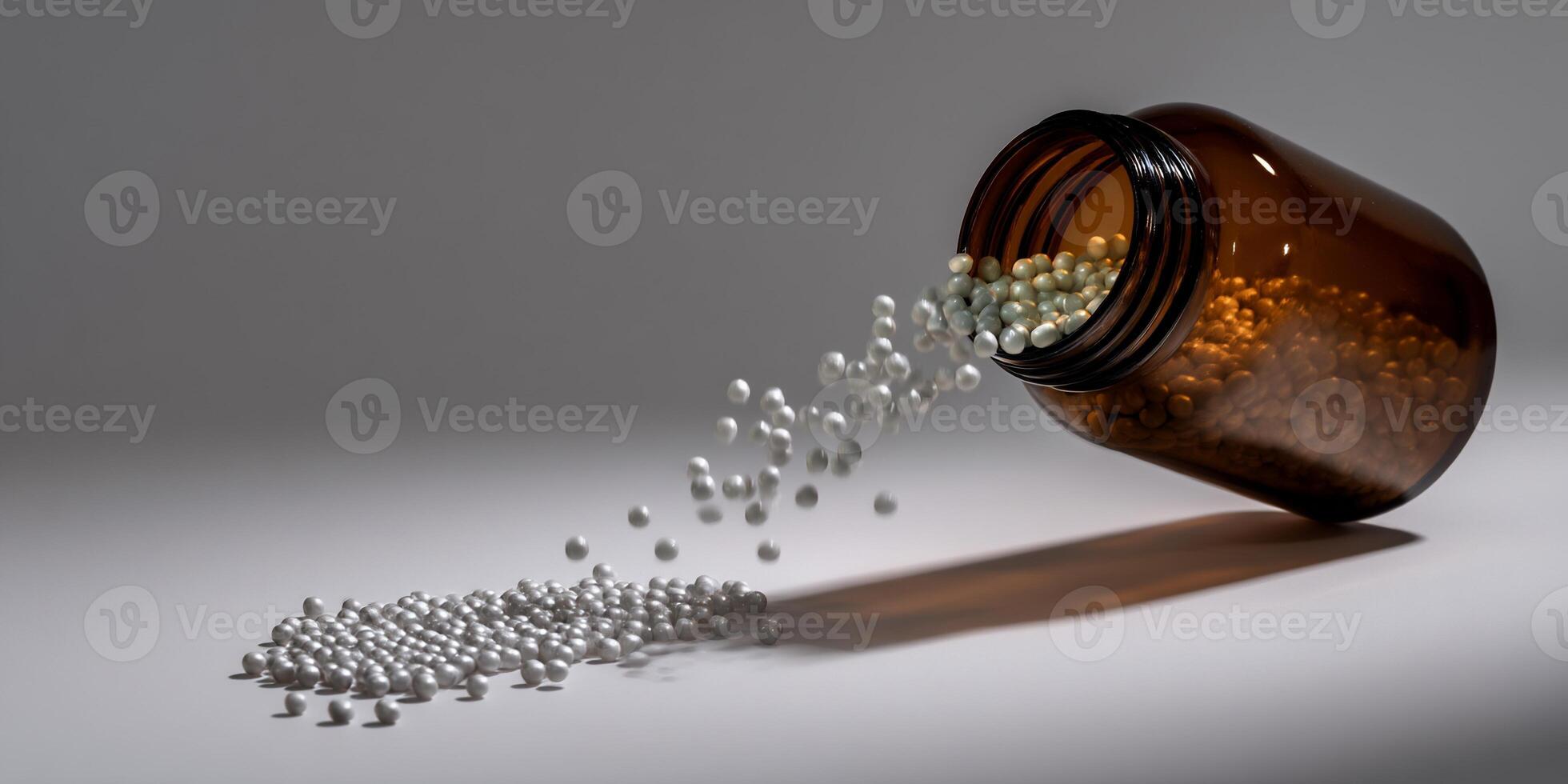A jar filled with pills spilling out onto the ground photo