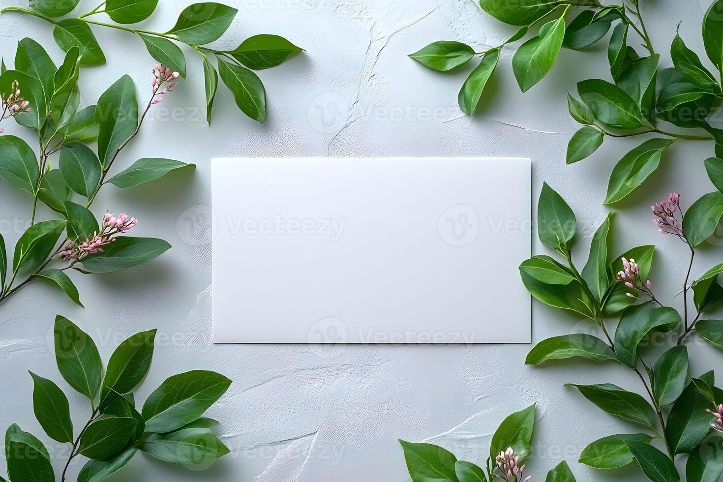 Blank Card on Textured Surface with Lush Green Foliage for Nature-Inspired Designs photo
