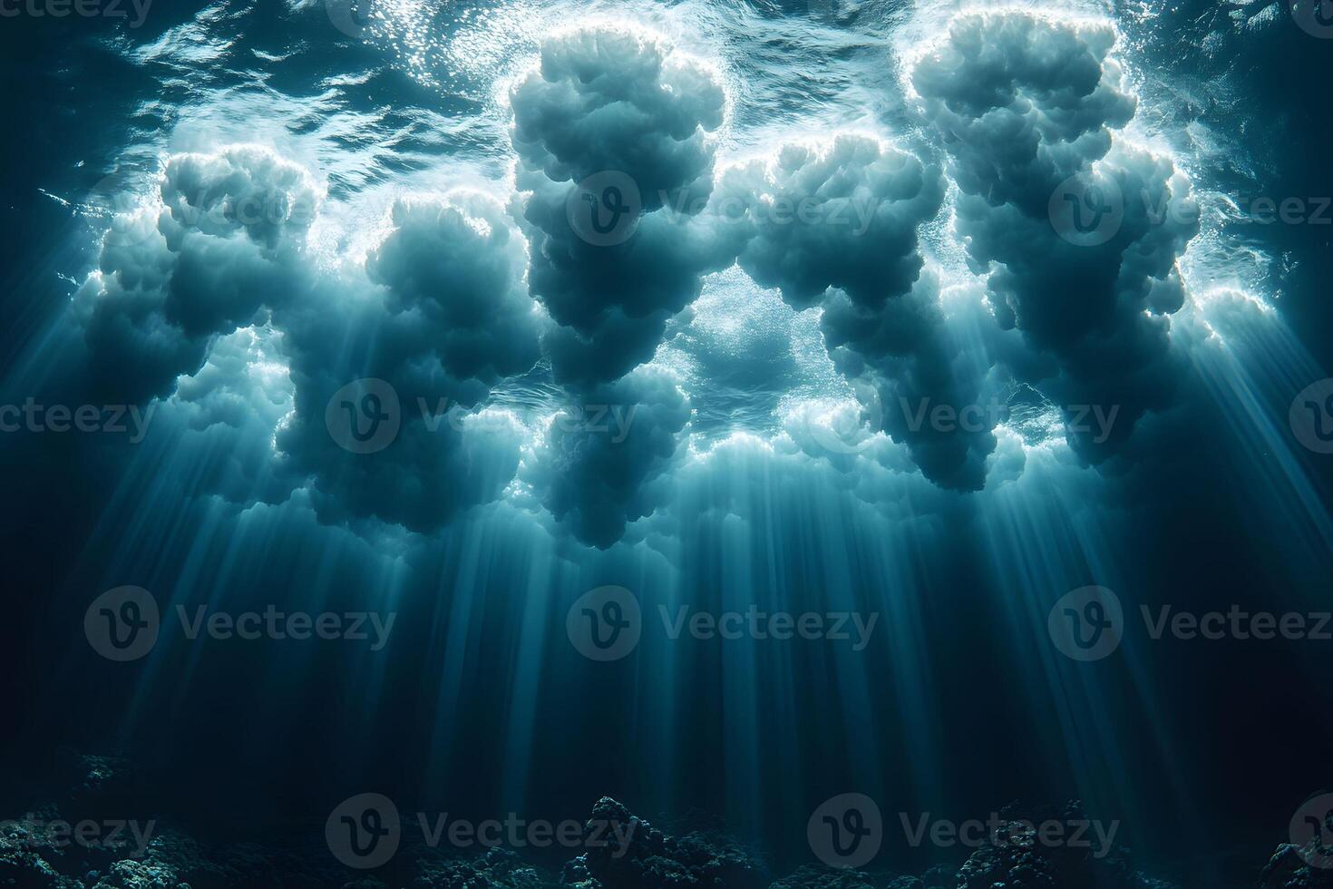 Enchanting Underwater Scene with Sunlight Beams and Cloud-Like Formations photo