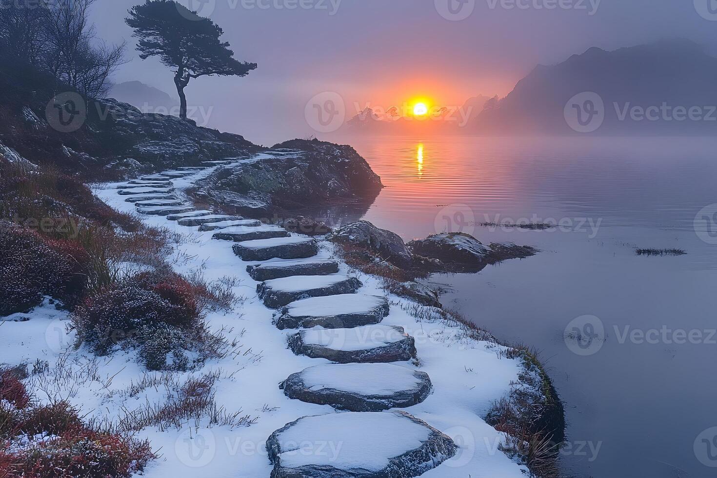 Tranquil Winter Sunrise Over Frosty Stone Path and Misty Lake Landscape photo
