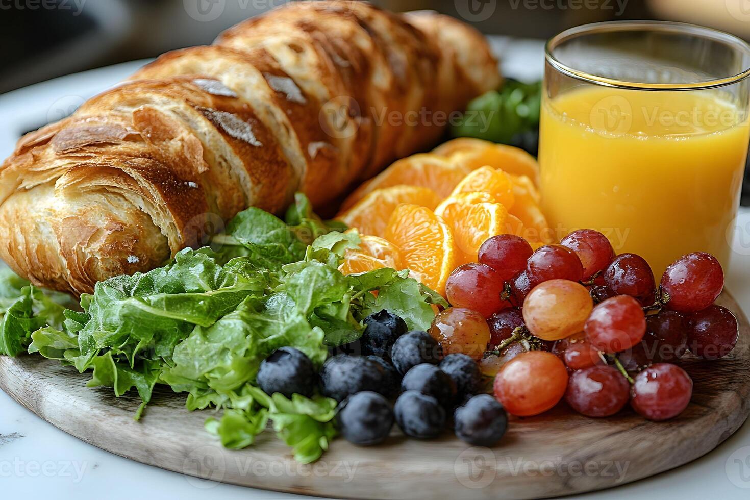 Healthy Breakfast Spread with Fresh Fruits, Croissant, and Orange Juice for a Vibrant Start photo
