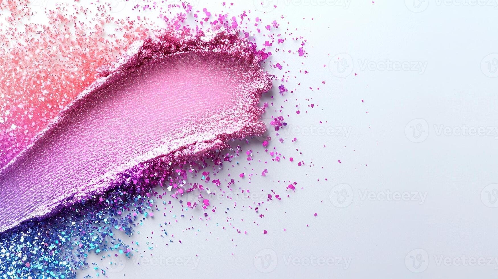 Crushed makeup palette revealing shimmering eyeshadow colors blending into gradient texture against soft white surface photo