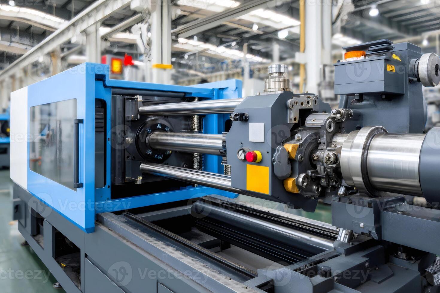 Plastic injection molding machine operating in a busy factory photo