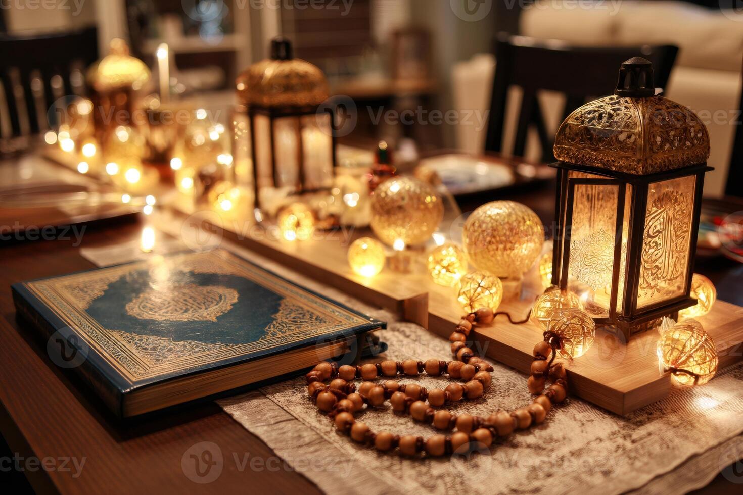 Quran, islamic lanterns, prayer beads, and fairy lights creating a warm ramadan atmosphere photo