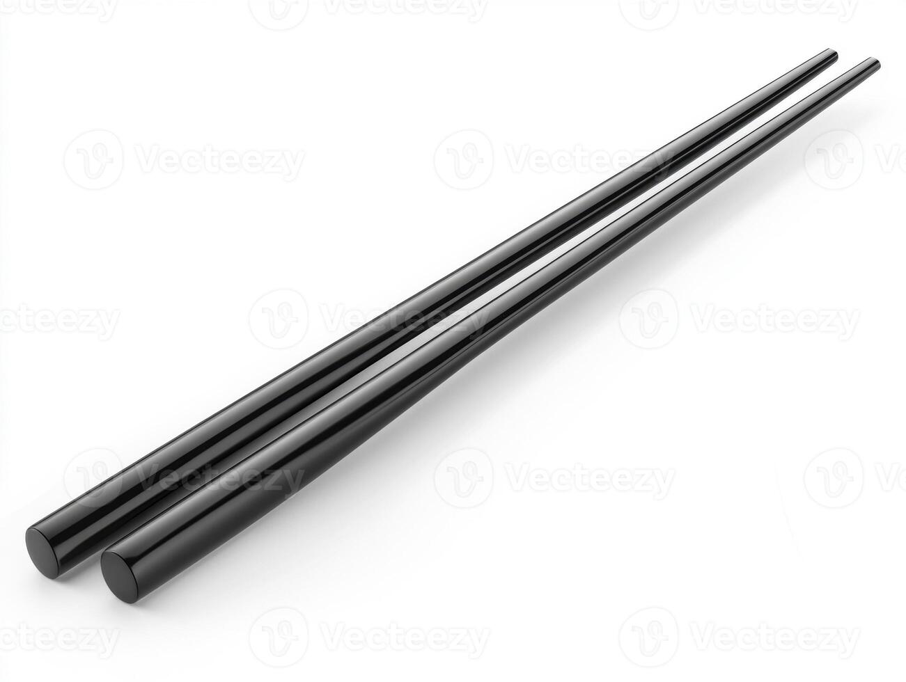 Elegant black chopsticks placed side by side on a white surface photo