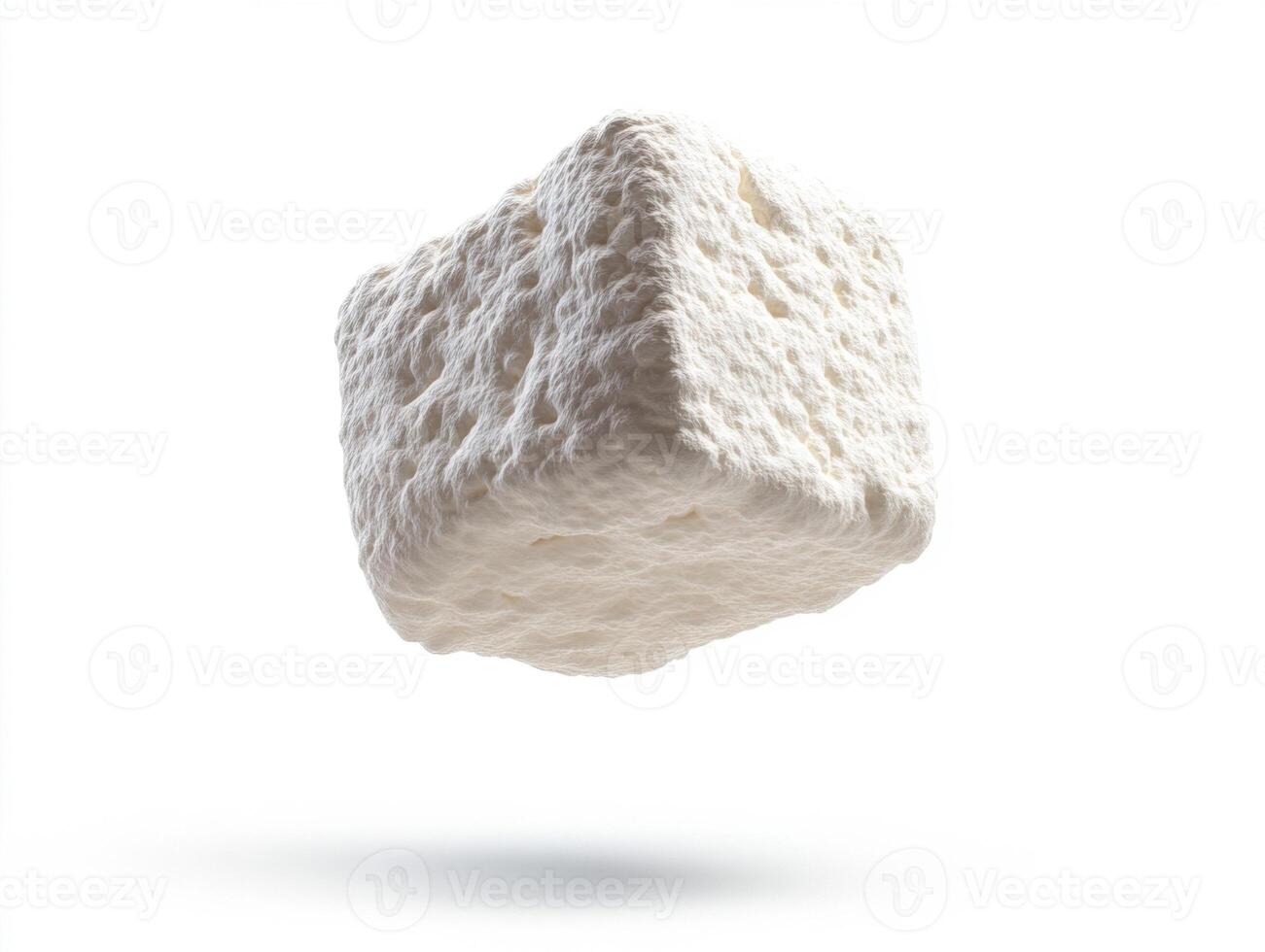 Floating white cube resembling fluffy marshmallow in bright light photo