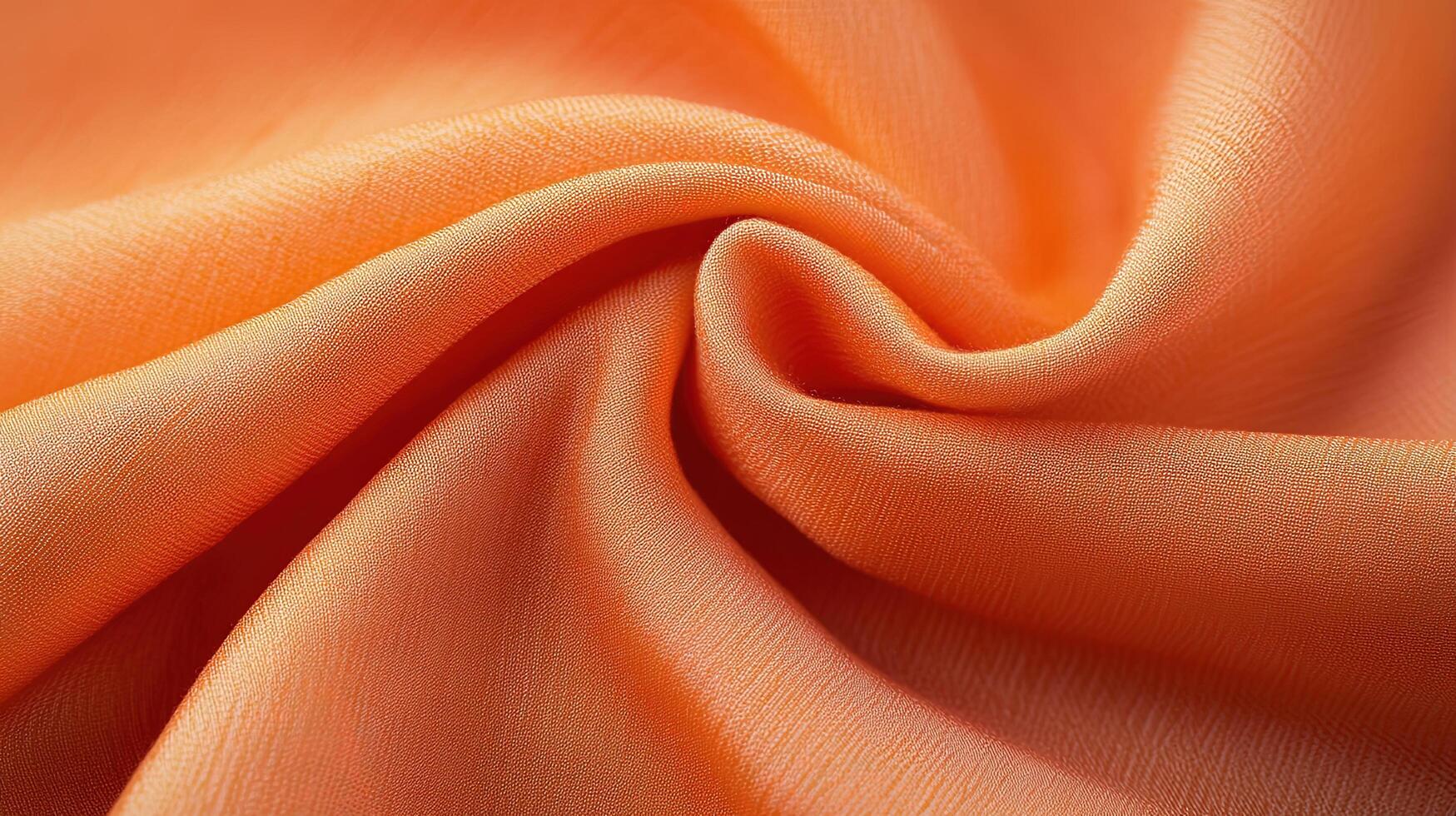 Close-Up View of Vibrant Orange Fabric Texture for Background Design photo