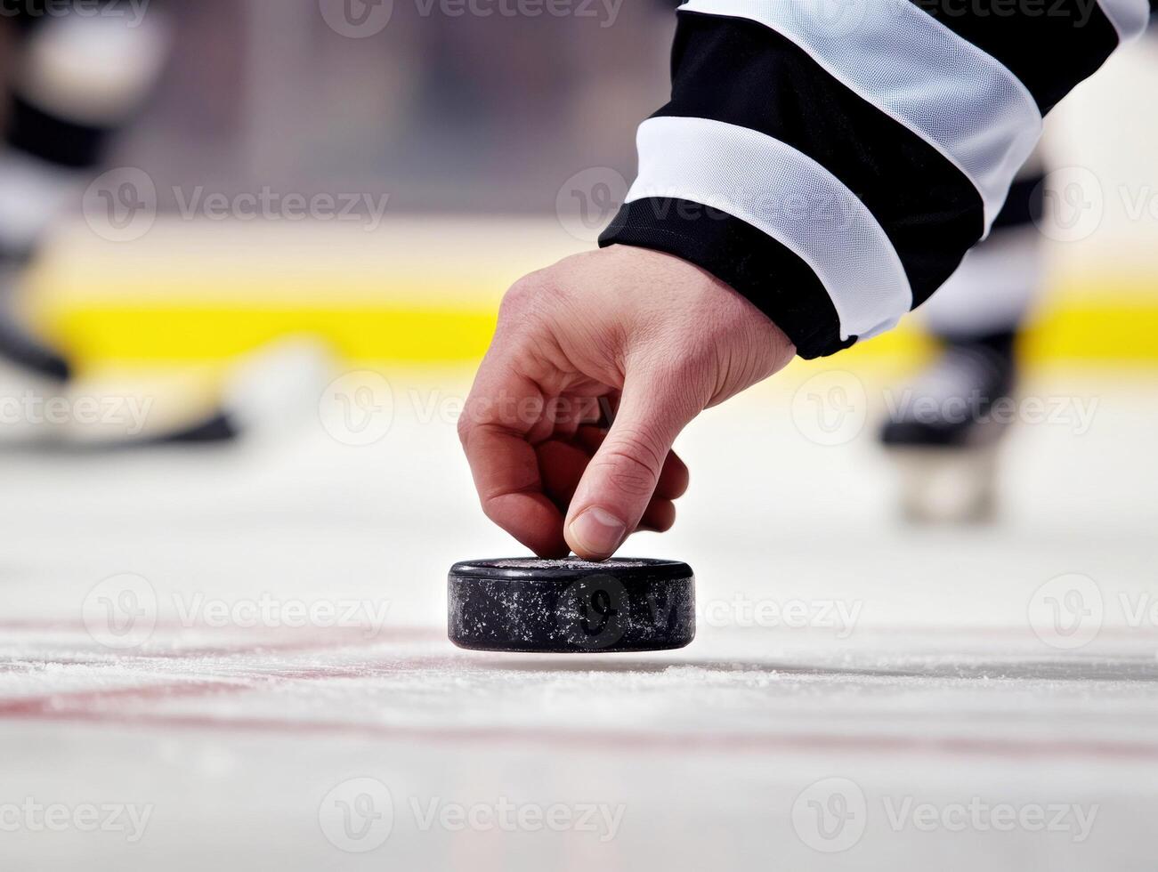 Player prepares to take a shot during a hockey game on the ice photo
