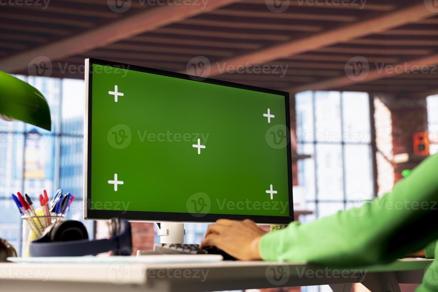 Man enjoying leisure time in apartment, using isolated screen PC screen to text friends. Person talking with mates on social network internet website using mockup computer display, close up photo
