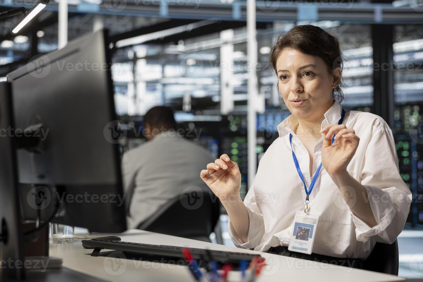 Data center technician inspecting gear, doing maintenance tasks, checking performance diagnostics. Server farm employee conducting system checks to ensure operational stability across network rigs photo