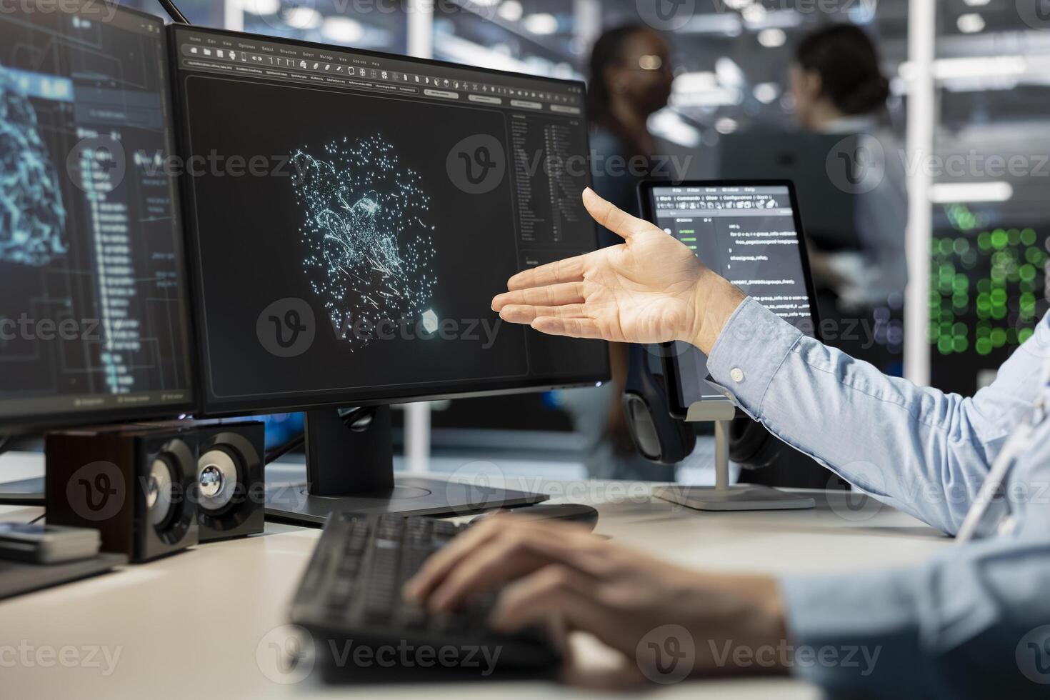 Close up of programmer looking at computer monitor in data center, managing server virtualization, running scripts. Worker using programming language on PC screen in server farm photo