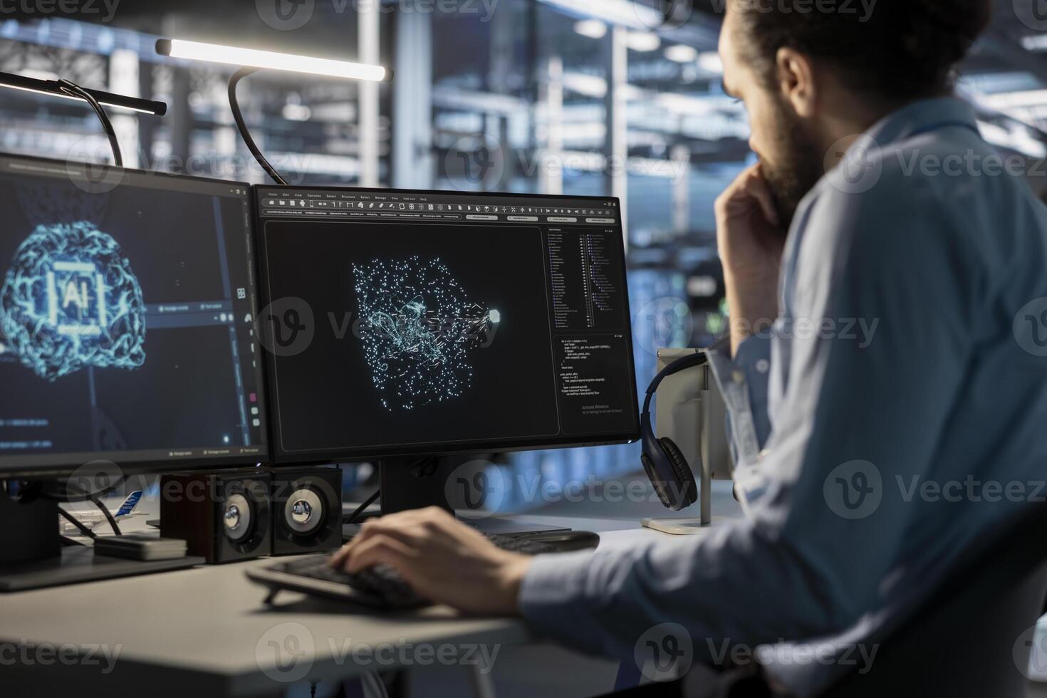 Software developer using computer to oversee server cabinets doing data intensive operations. IT specialist using PC to supervise supercomputers maintaining storage for machine learning photo