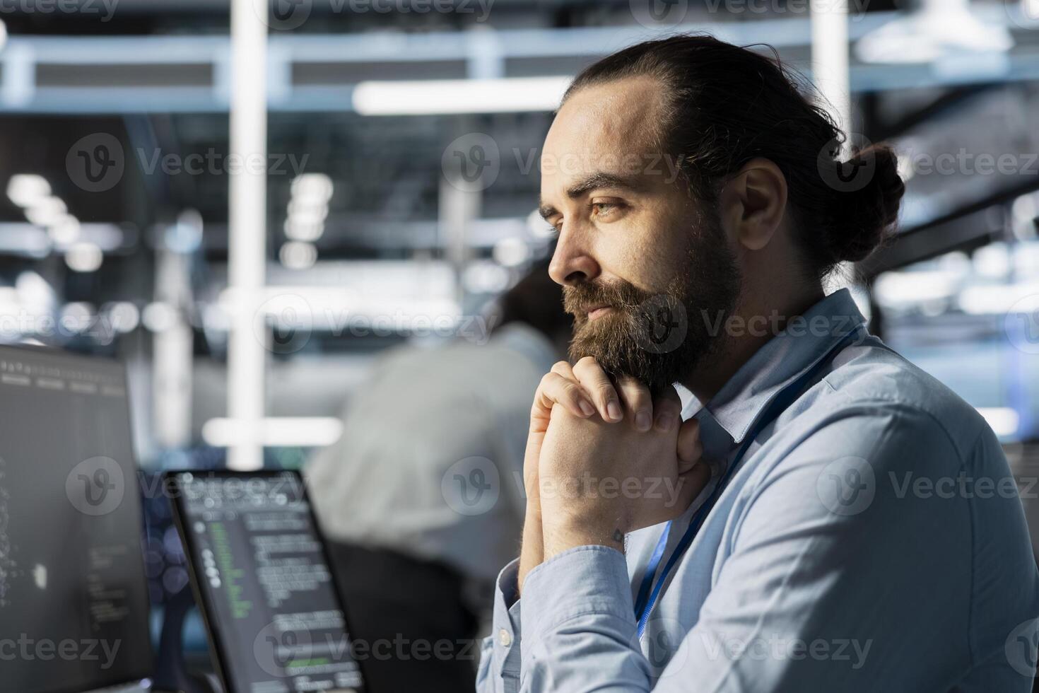 Computer scientist in data center doing software updates, verifying neural network metrics. Server hub facility IT professional inspects configurations, ensuring optimal application performance photo